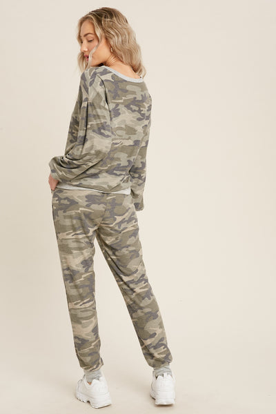 Back view of camo joggers paired with matching long sleeve camo top.