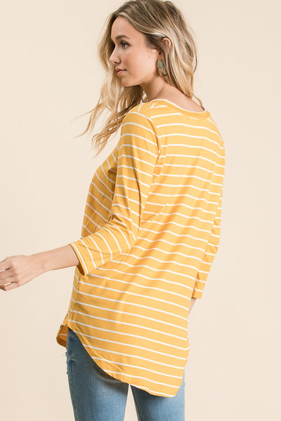 Back of "mustard" golden colored striped 3/4 sleeve tunic with long rounded hem with good coverage.