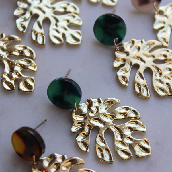Gold leaf earrings with green acrylic stud.
