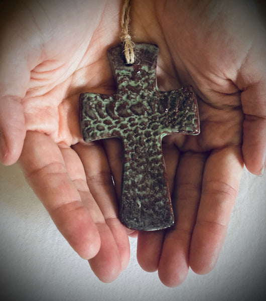 Handmade cross gift. Flared hanging cross in moss green.