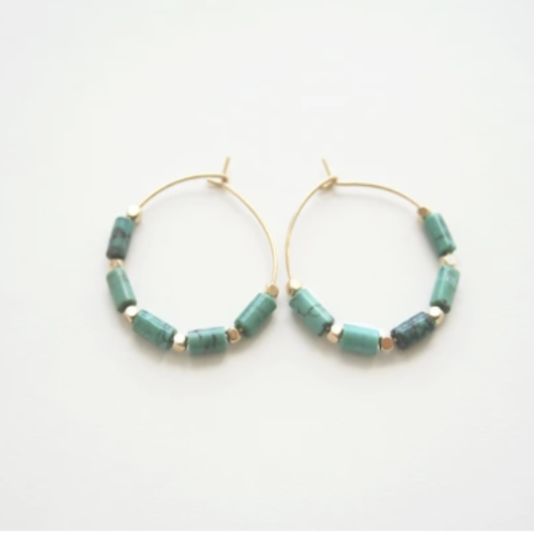 Beautiful gold hoops with turquoise and gold beads.
