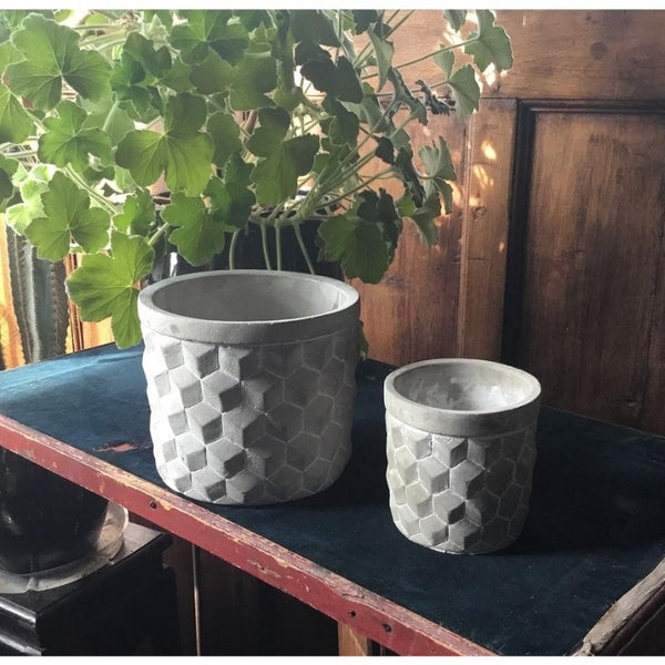 Unique outdoor planter in both medium and small sizes.