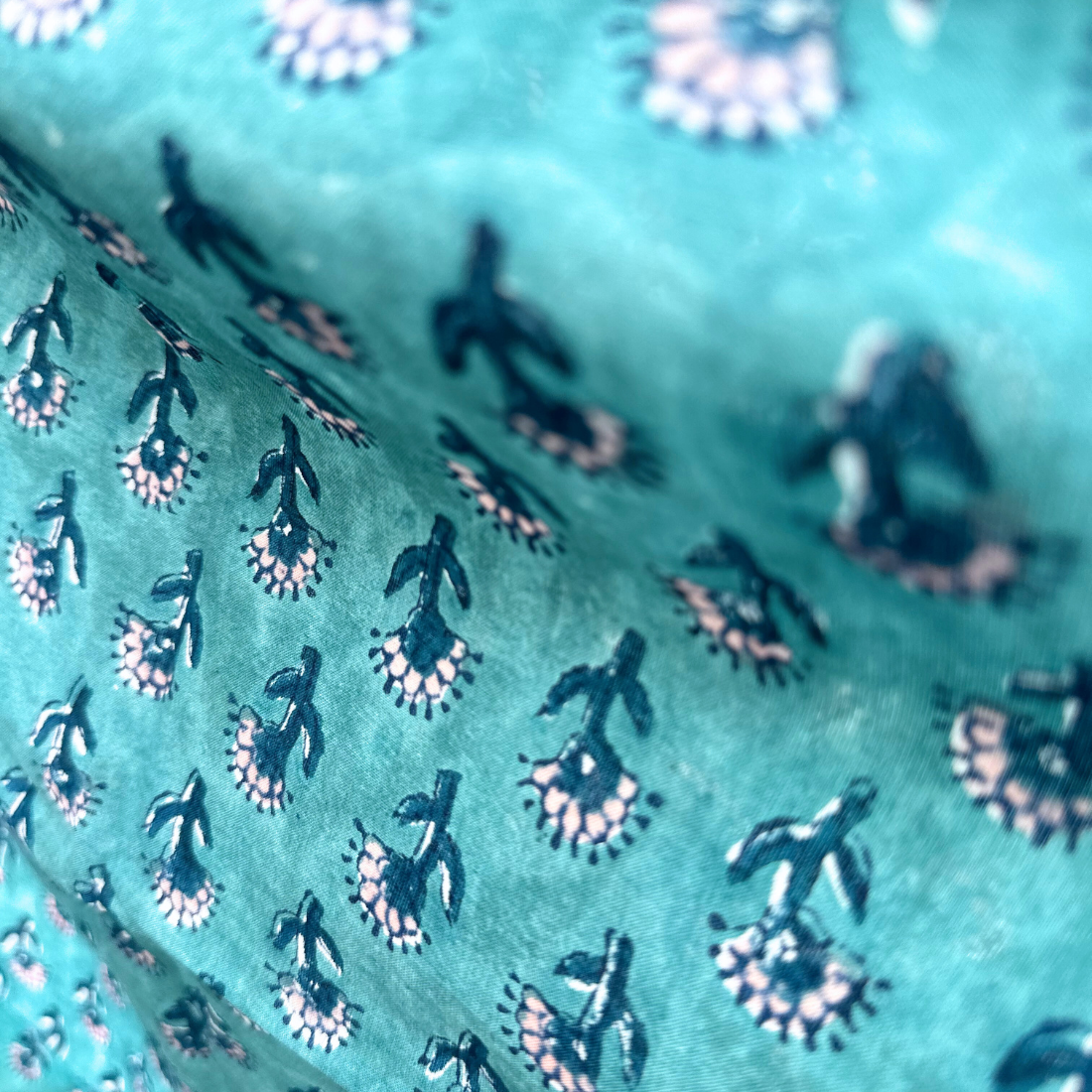 Block print pareo in aqua fiesta cotton textile.