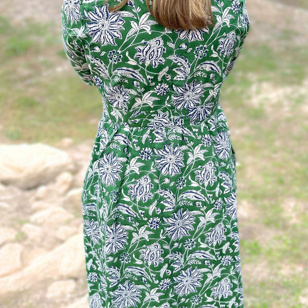 Green dahlia floral cotton day dress back view.