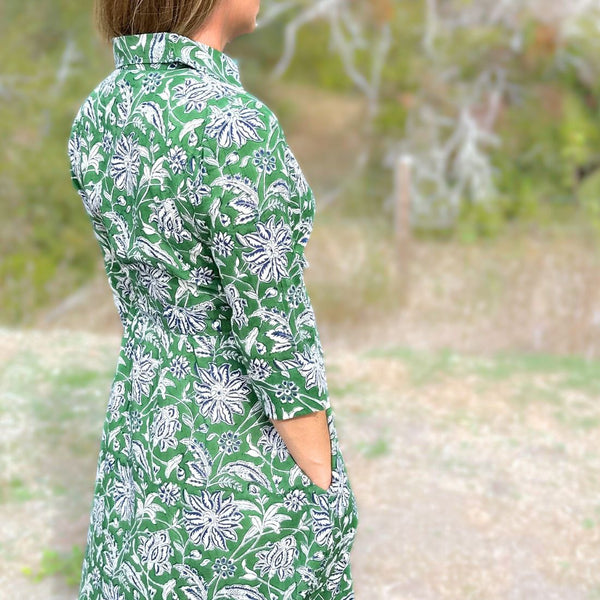 Green dahlia floral cotton day dress with pockets.