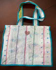 Kantha stitch bags. Neutral pattern with faint leaves.