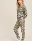 Side view of matching camo joggers and top in relaxed fit.