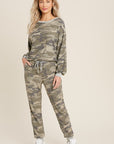 Women's lightweight camo jogger pants paired with matching long sleeve top.