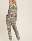 Relaxed fit women's camo top with drop shoulder.