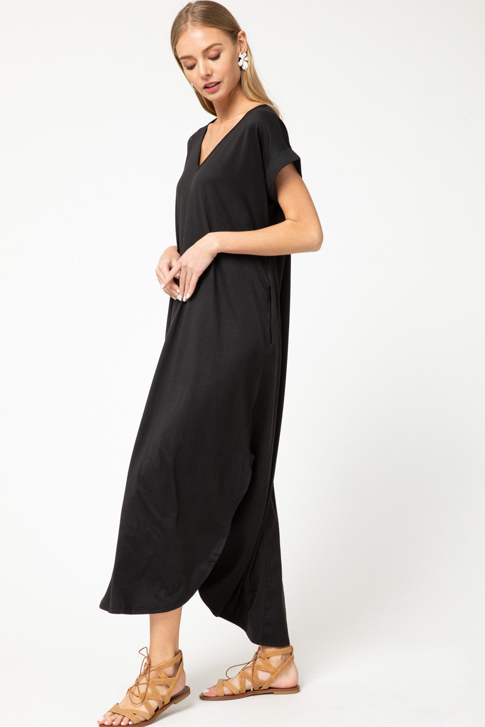 Side view of women&#39;s boutique online clothing black must have maxi