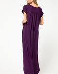 Back view of plum maxi with pleating at back yoke.