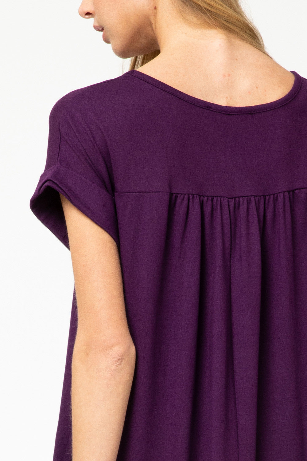 Close up of plum maxi pleated yoke.