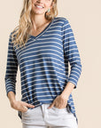 Women's 3/4 sleeve tunic in v-neck blue color with white horizontal stripes.