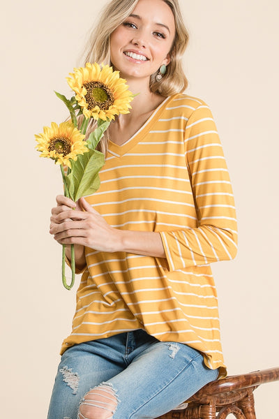 V-neck 3/4 sleeve tunic in goldenrod "mustard" color with white stripes.