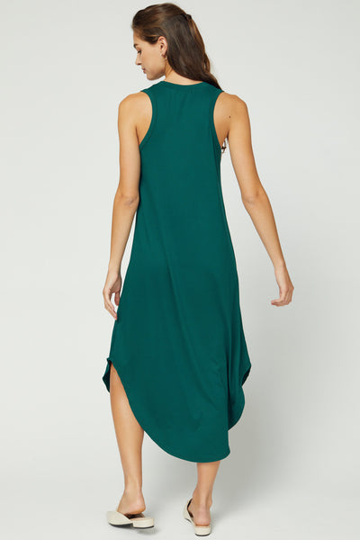 Back view of sleeveless midi with rounded hem and very slight cut in/racerback strap cut in hunter green.