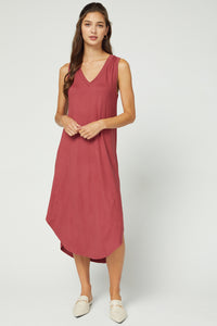 Sleeveless v-neck midi in marsala paired with neutral colored mules.