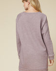 Back view of round neck sweater dress in mocha heather color.