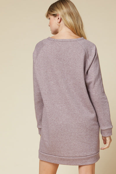 Back view of round neck sweater dress in mocha heather color.