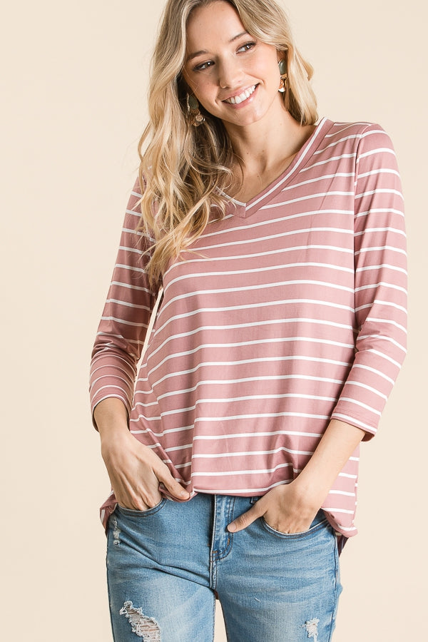 Women&#39;s 3/4 sleeve tunic with v-neck in mauve with white stripes.