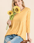 3/4 sleeve tunic in "mustard" goldenrod color with white stripes.