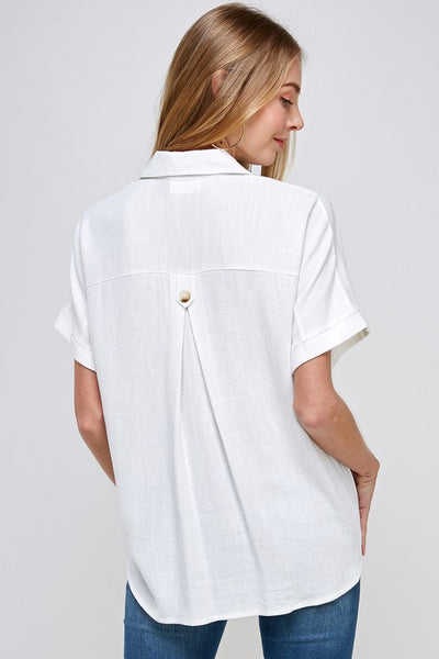 back view of white linen tie front top with cute pleat detail at back yolk