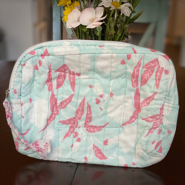 Cute cotton travel pouch in aqua and pink tropical print.