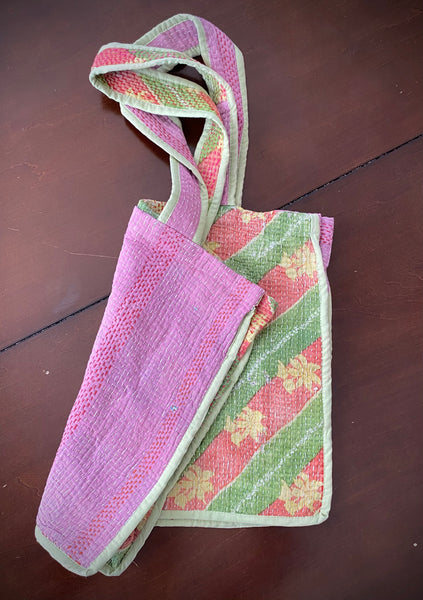 Kantha stitch bags. Reverse side of pink bag with pink and green floral pattern.