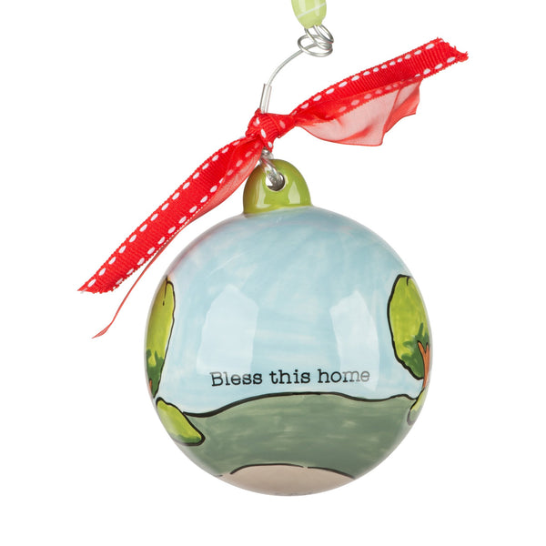 Christmas ornament for new house. Back view with quote, "Bless this home."
