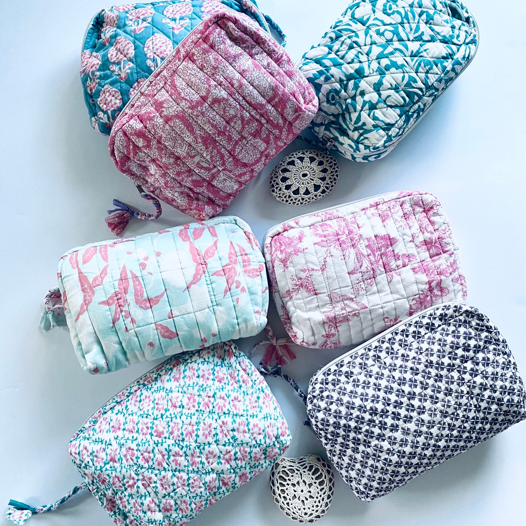 Cotton travel pouches for toiletries.