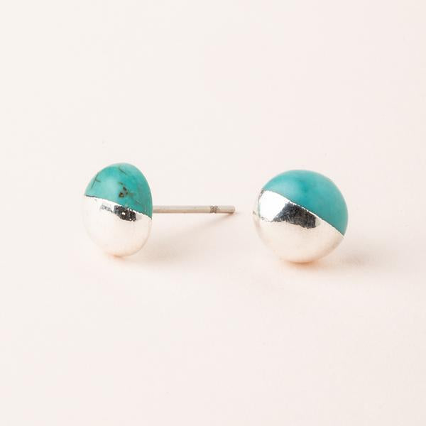 Turquoise tone studs dipped in sterling silver.