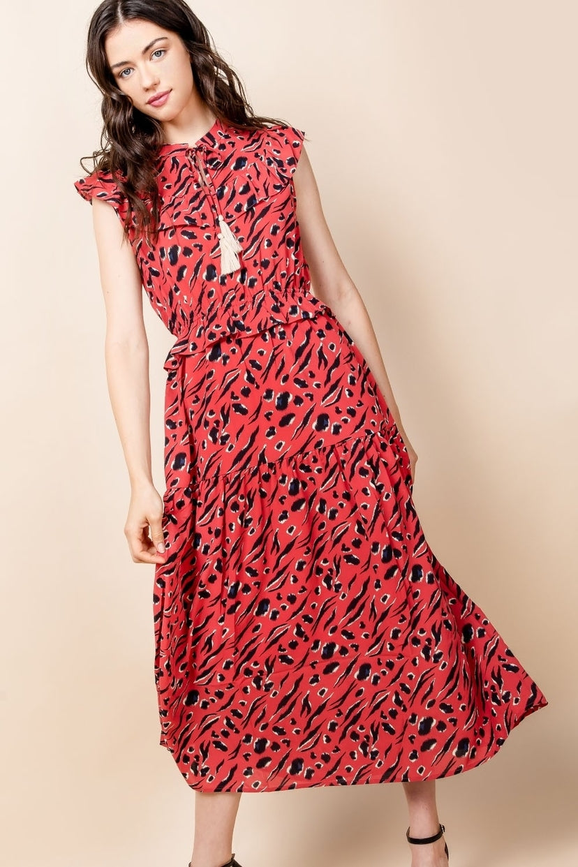 Sleeveless ruffle sleeve tiered animal print maxi dress.