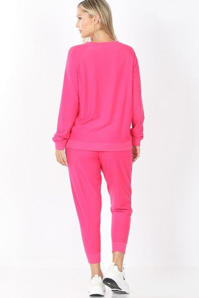 Back view of french terry jogger set in hot pink.