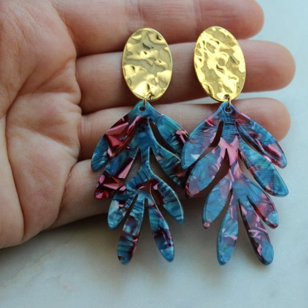 Bold statement earrings with gold and rich colorful acrylic leaves.