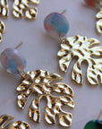 Gold leaf earrings with baby blue and  pink acrylic stud.