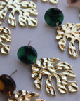 Gold leaf earrings with green acrylic stud.