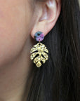 Gold leaf earrings with hot pink and teal acrylic stud.