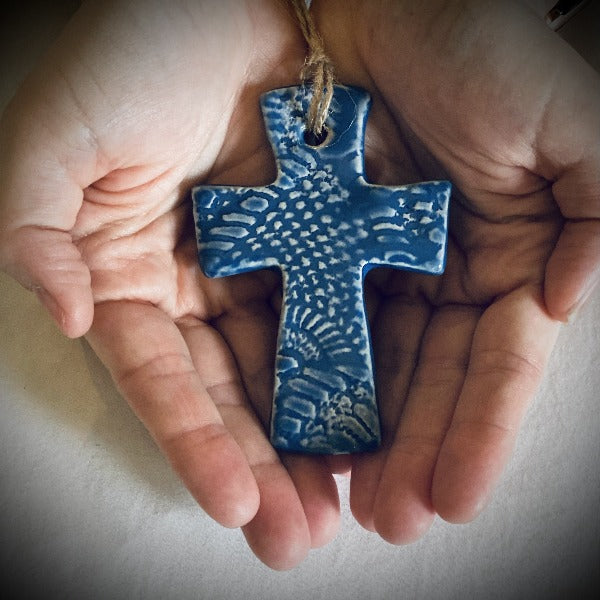 Handmade cross gift. Flared hanging cross in sapphire blue.
