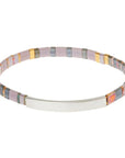 Miyuki bracelet with dusk colored glass beads and silver bar.