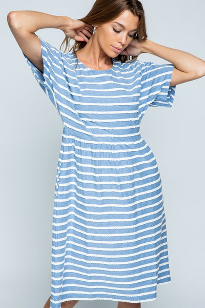 Blue short sleeve midi dress with white stripes and pockets.