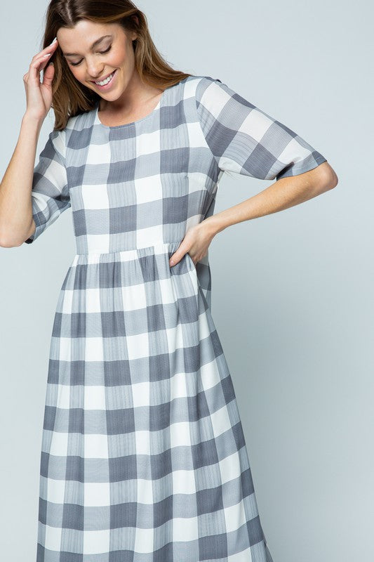 Grey and white buffalo check midi dress.