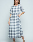 Round neck elbow length sleeve grey and white checkered midi dress with pockets!