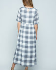 Back view of white and grey large check midi length dress with keyhole closure.