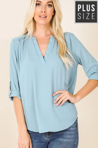 Plus size split v-neck tab sleeve top in blue grey color.