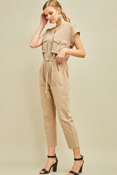 Khaki cargo button front drawstring waist jumpsuit with cap sleeves.