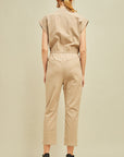 Back view of khaki colored cap sleeve straight leg drawstring waist jumpsuit.