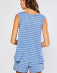 rear view of pinstripe loungewear set of sleeveless swing top and drawstring shorts