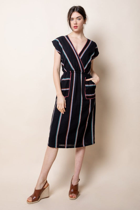 Black v-neck midi patio dress with colorful vertical stripes.