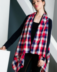 Festive women's plaid cardigan with drape front unbuttoned. Blue and red checkered plaid.