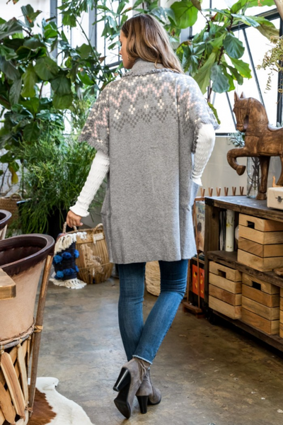 Grey women's bohemian style sweater with blush, ivory, and grey embroidery. So beautiful! Short sleeve cardigan is long.