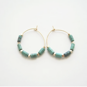 Beautiful gold hoops with turquoise and gold beads.